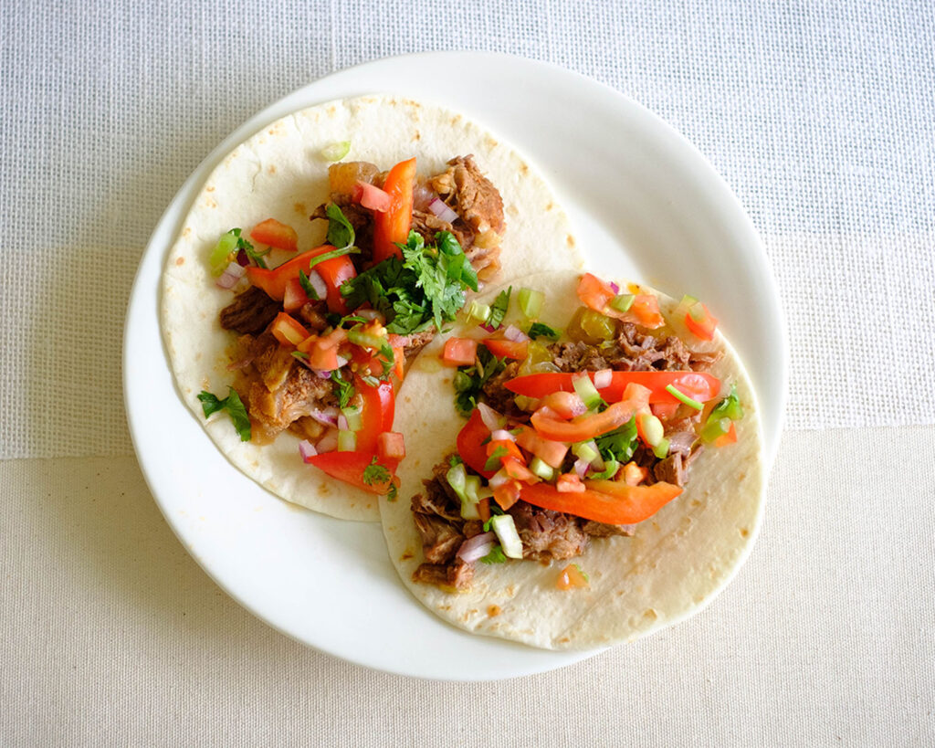 round plate with instant pot beef soft tacos