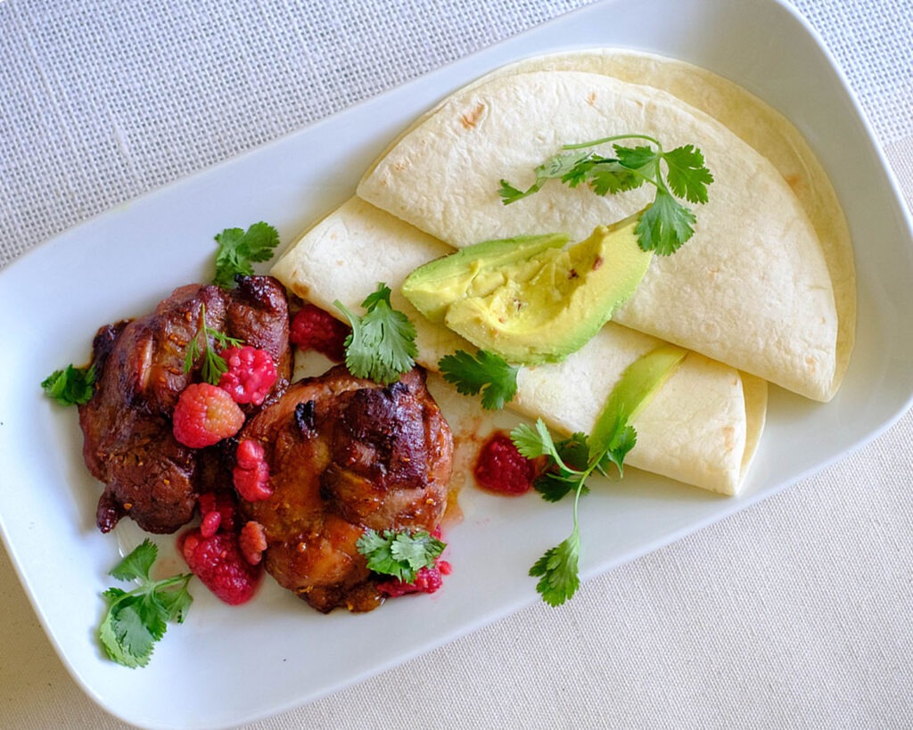 raspberry chicken soft tacos in rectangle plate