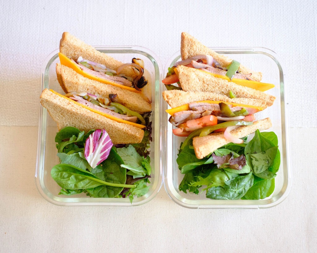 meal prep containers with beef deli sandwich