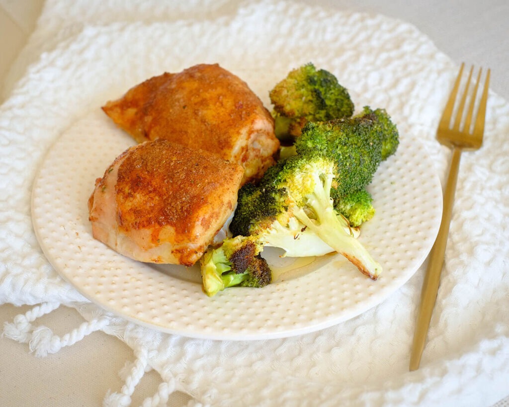 round plate with air fryer chicken and broccoli