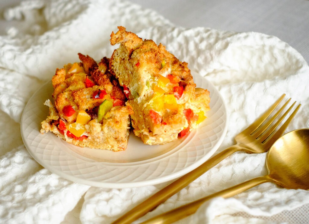 round plate with bread pudding with bell peppers