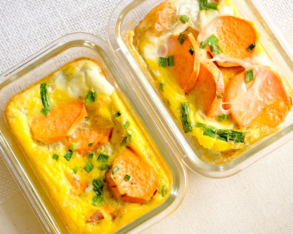 glass meal prep containers with baked egg frittata and sweet potato