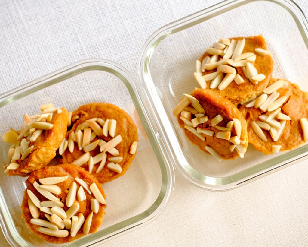 glass breakfast meal prep containers with persimmon muffins