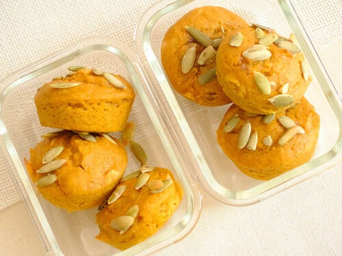 glass meal prep containers with pumpkin muffins
