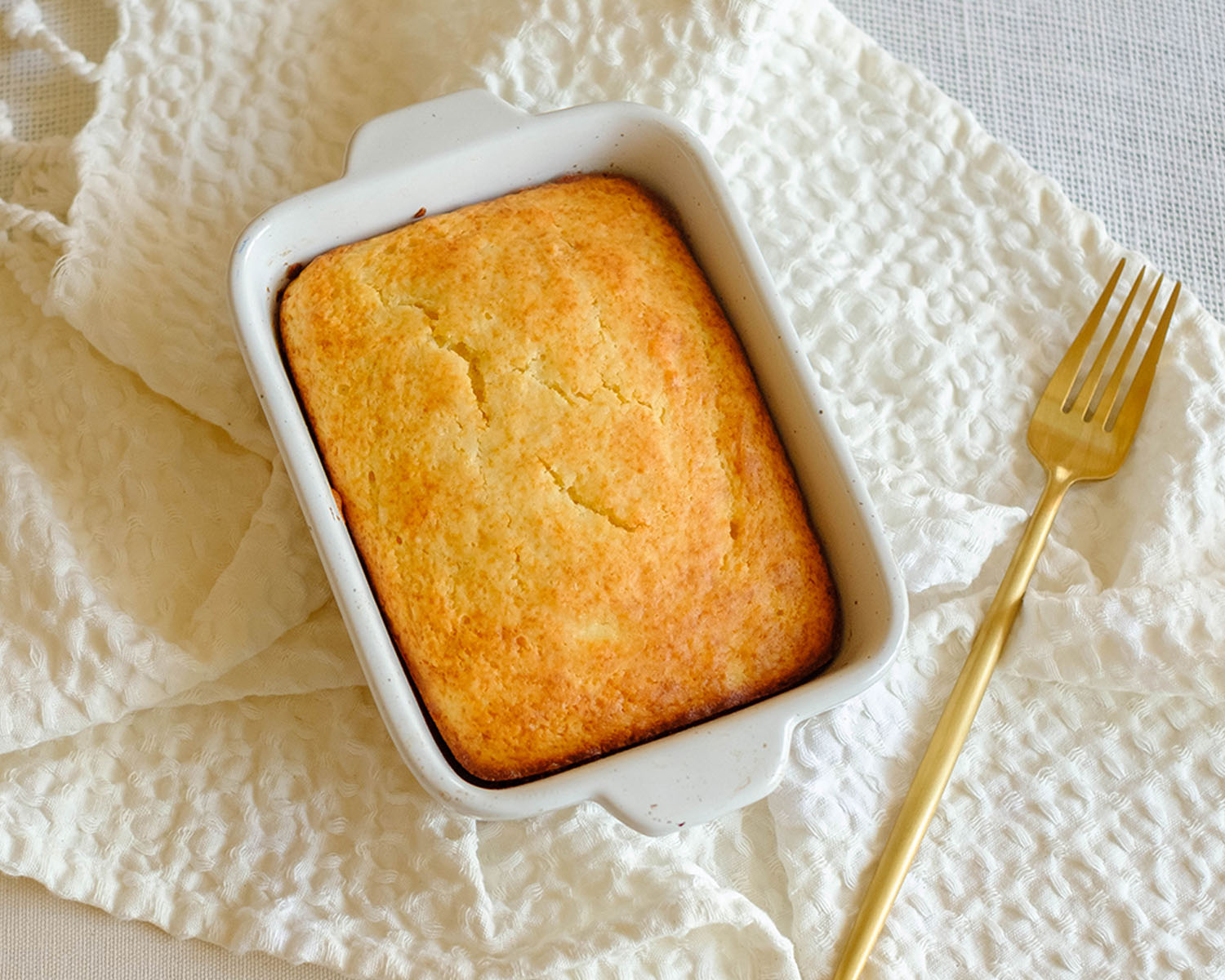 rectangle baking dish with a lemon ricotta breakfast cake