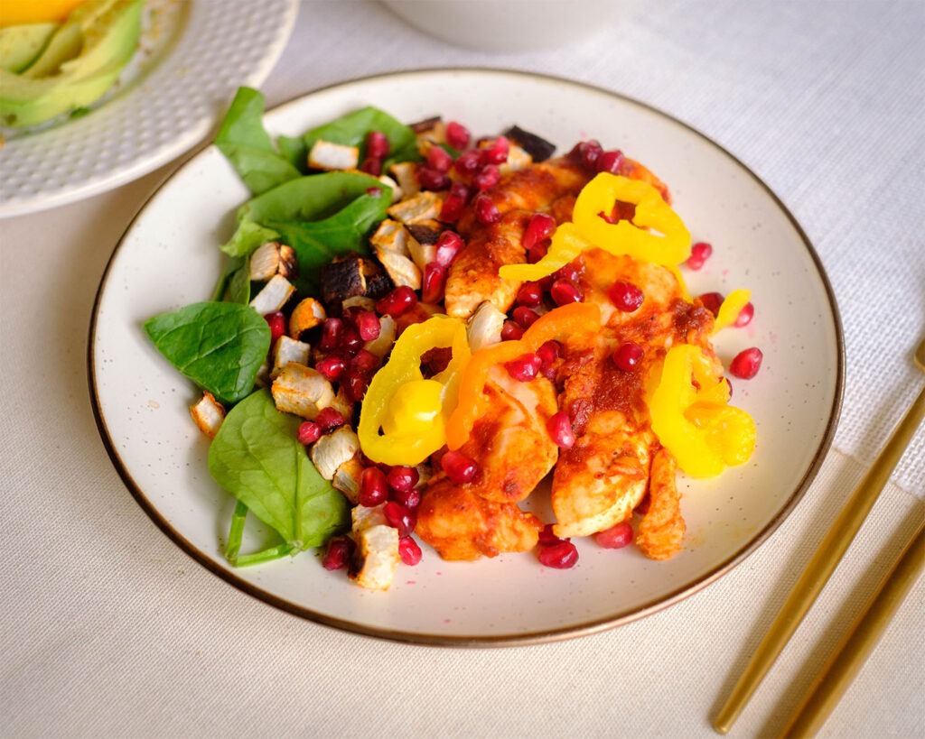 oven baked harissa chicken on a plate