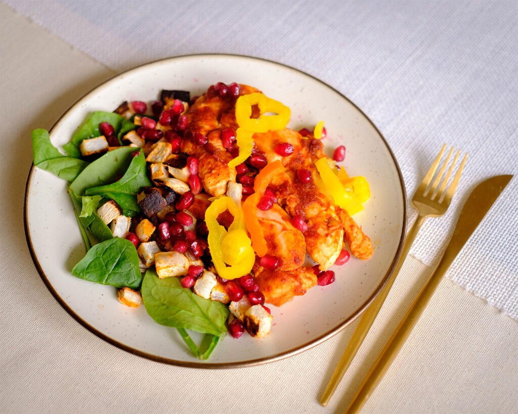 oven baked chicken harissa on a plate