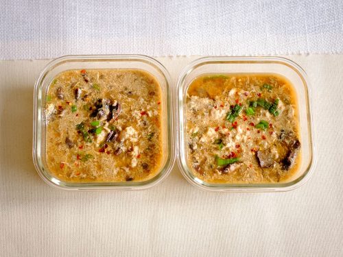 rectangular meal prep containers of hot and sour soup