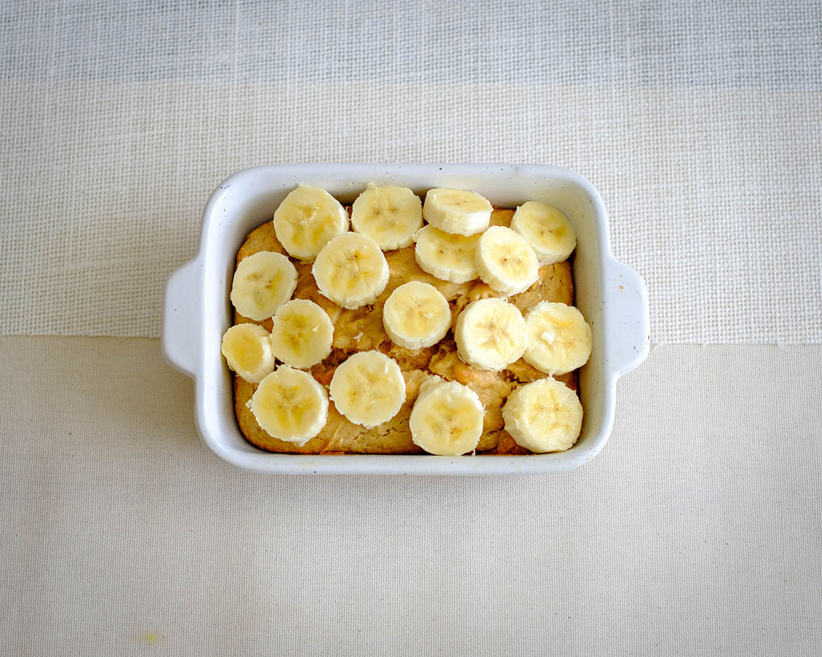 rectangle baking dish with peanut butter muffin with banana slice topping