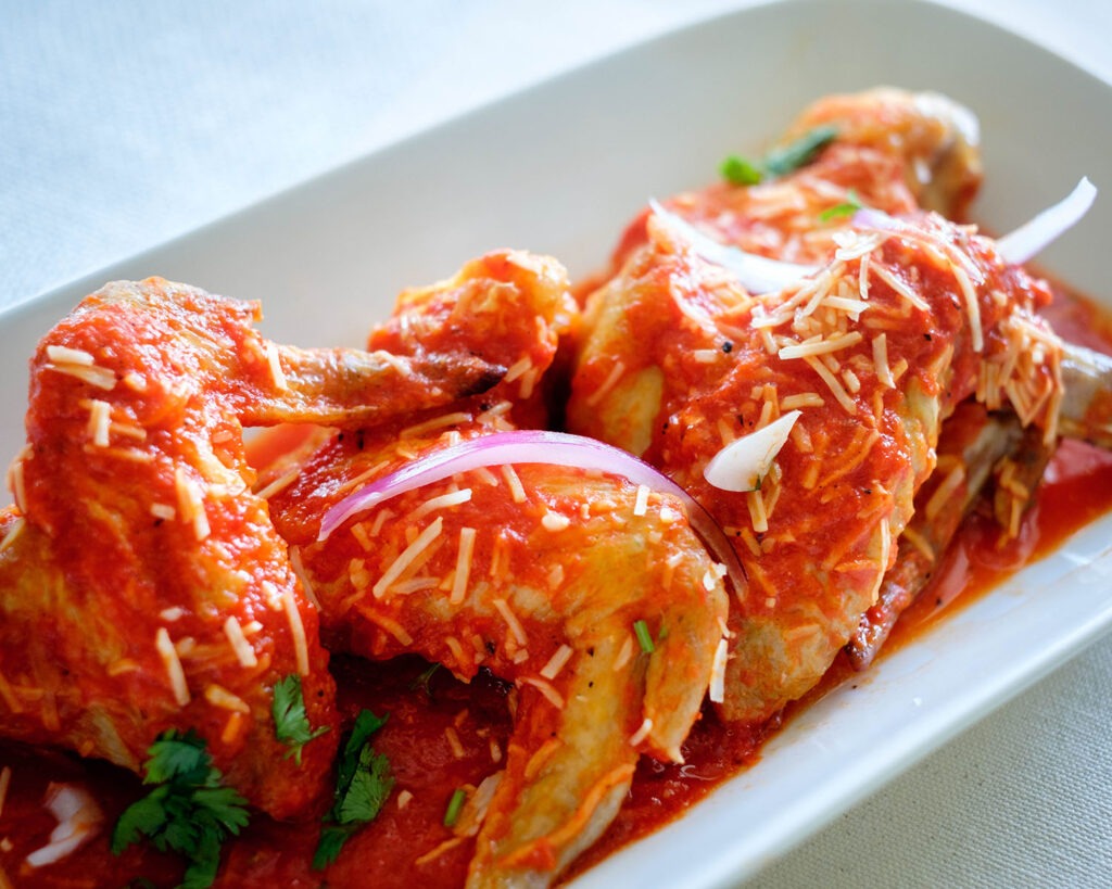 chicken wings in a red pepper sauce