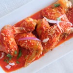 chicken wings in a red pepper sauce