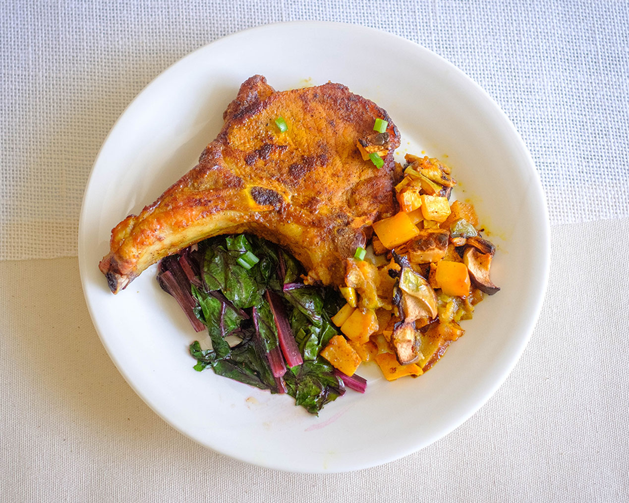 Pan-fried pork with rutabaga and beet leaves