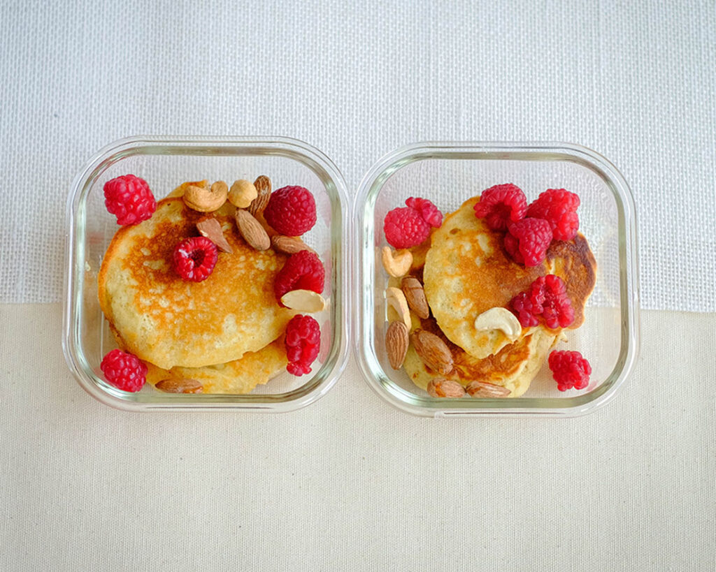 mini pancakes with raspberries and mixed nuts