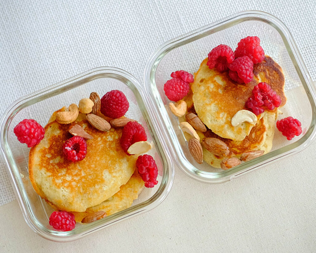 mini pancakes with raspberries and mixed nuts