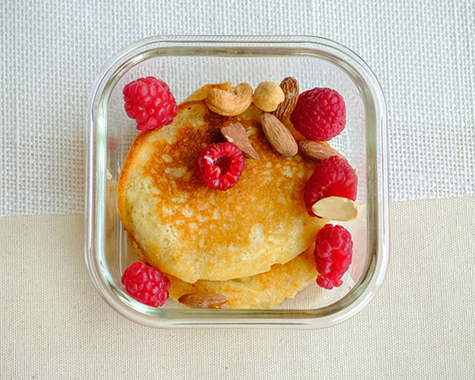 mini pancakes with raspberries and mixed nuts