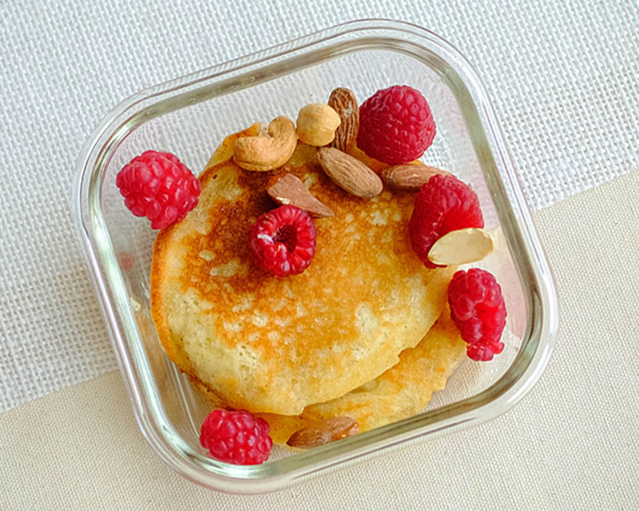 mini pancakes with raspberries and mixed nuts