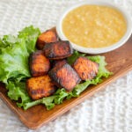 cajun salmon bites and creamed corn