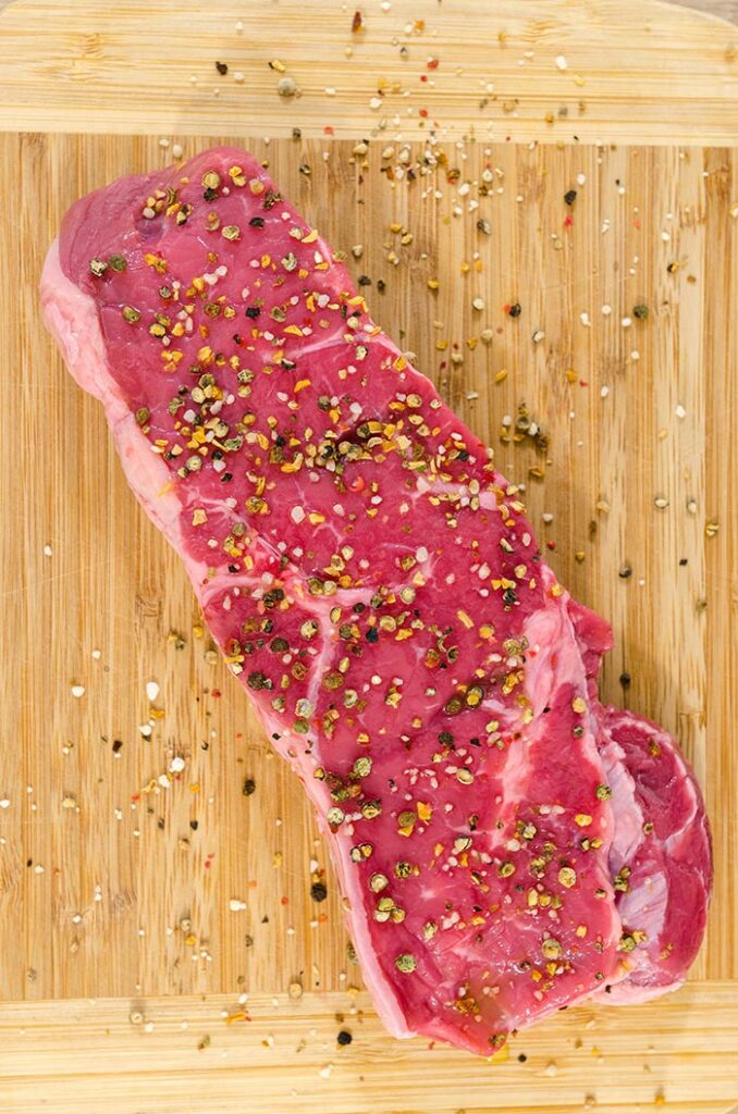 steak on a cutting board as a protein overhyped