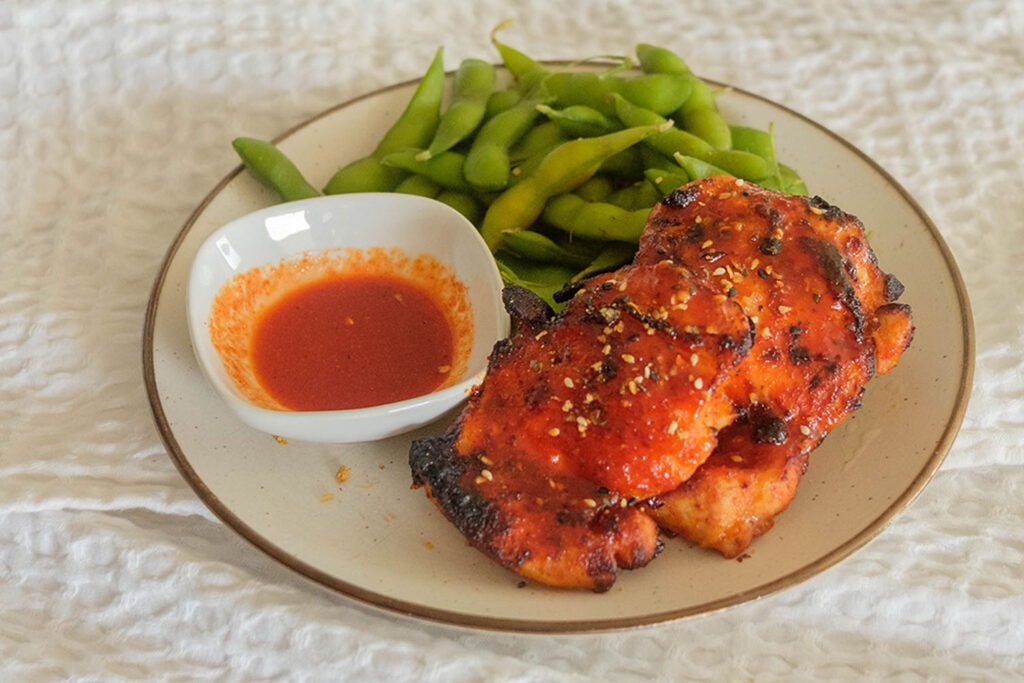 Air Fryer Chicken with edamame and hot honey gochujang sauce