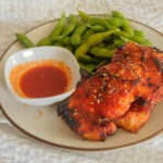 Air Fryer Chicken with edamame and hot honey gochujang sauce