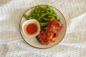 Air Fryer Chicken with edamame and hot honey gochujang sauce