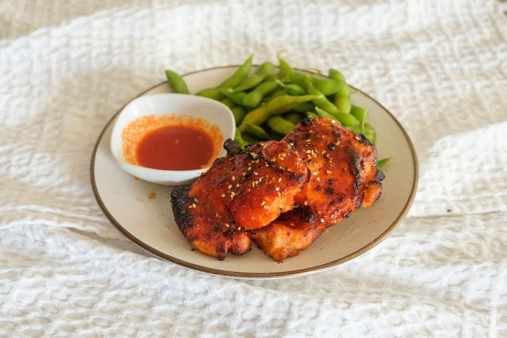 Air Fryer Chicken with edamame and hot honey gochujang sauce