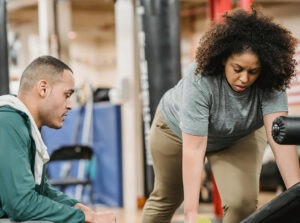 personal trainer with client